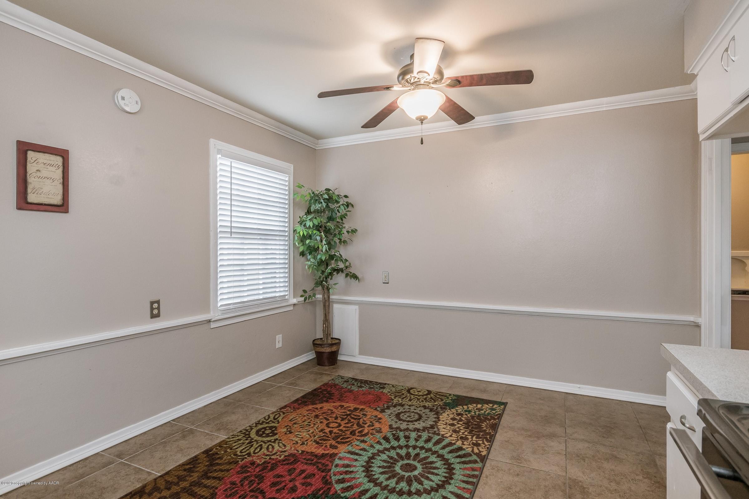 4301 South Jackson Street Amarillo, TX 79110 - Photo 6 of 18 a view of an empty room with a window