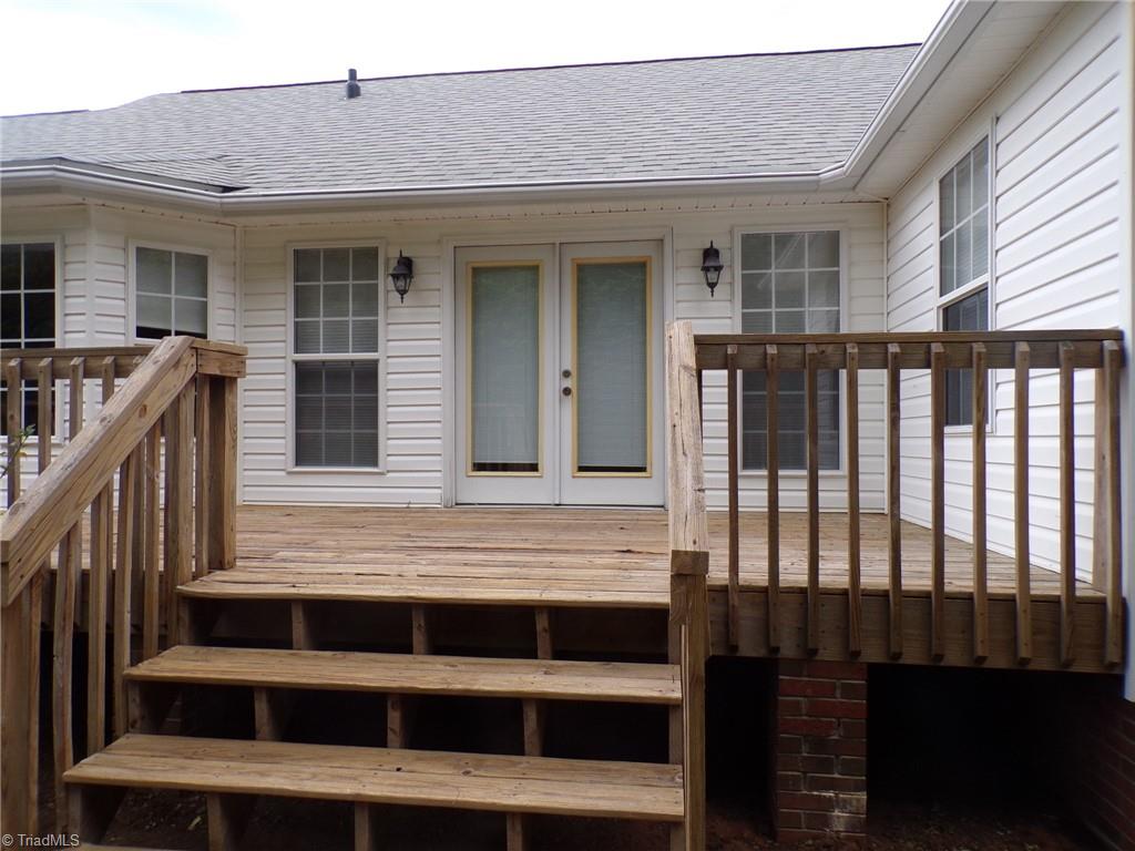 6236 Nat Road Julian, NC 27283 - Photo 25 of 34 Large back deck for entertaining.