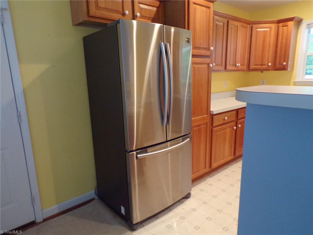 6236 Nat Road Julian, NC 27283 - Photo 5 of 34 Refrigerator conveys. Nice cabinets!