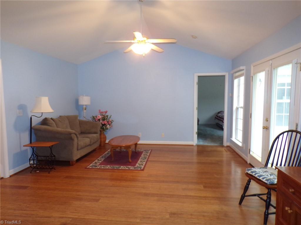 6236 Nat Road Julian, NC 27283 - Photo 10 of 34 Living Room with lots of natural light and double glass doors.