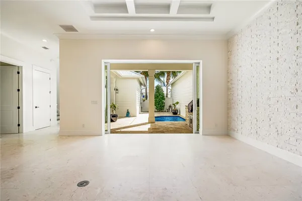 view of empty room with floor to ceiling window