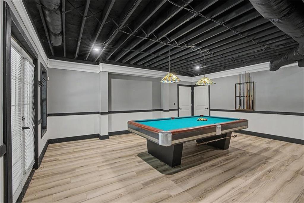 1136 Cole Lake Road Dallas, GA 30157 - Photo 50 of 72 a room with wooden floor pool table and wooden floor