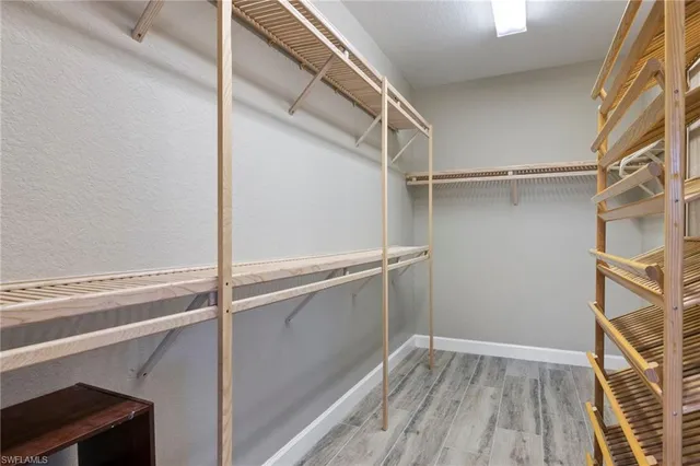 a view of an empty walk in closet