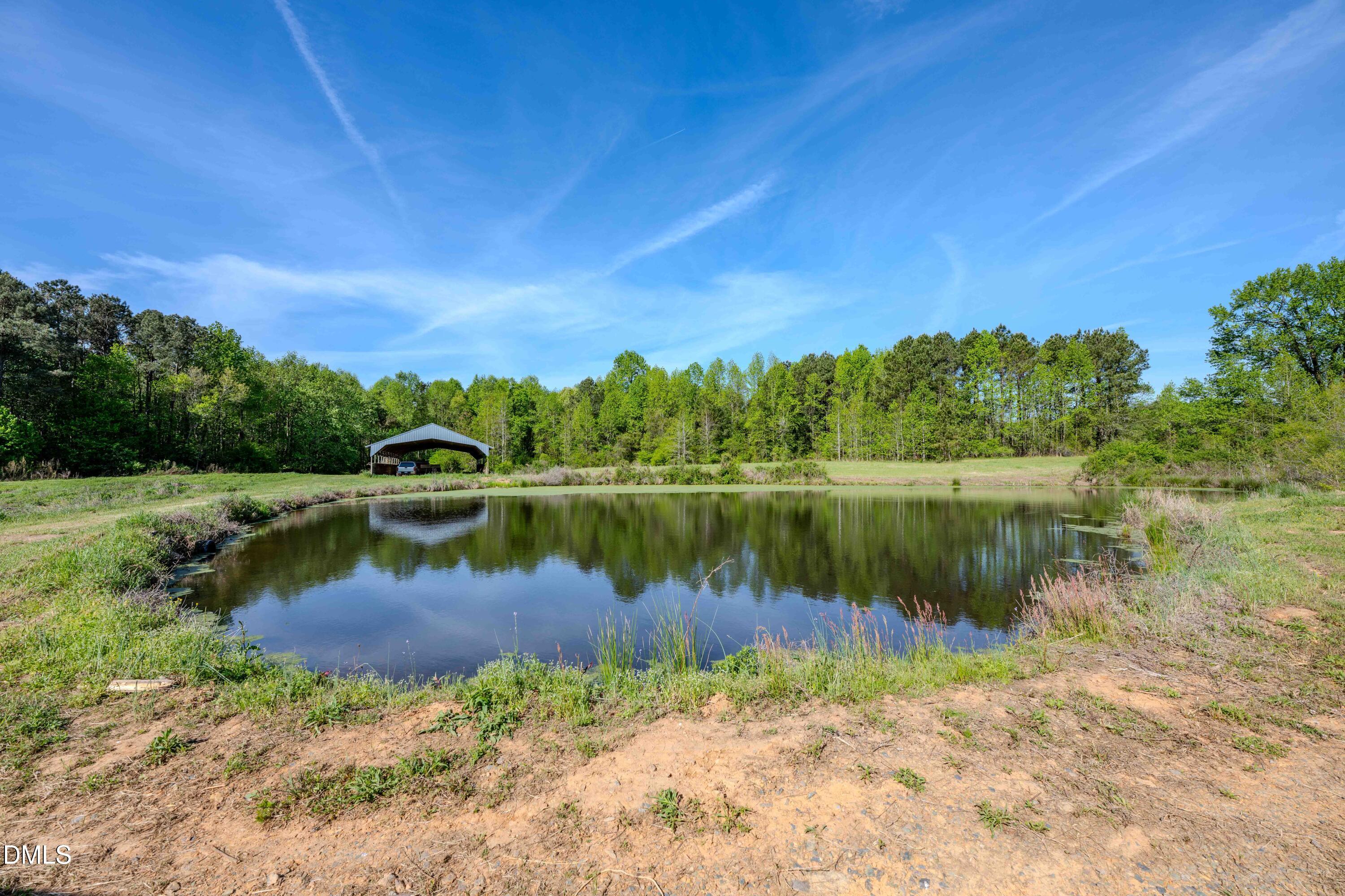 0 Bayles Road Lillington, NC 27546 - Photo 10 of 29 a view of a lake with houses in the background