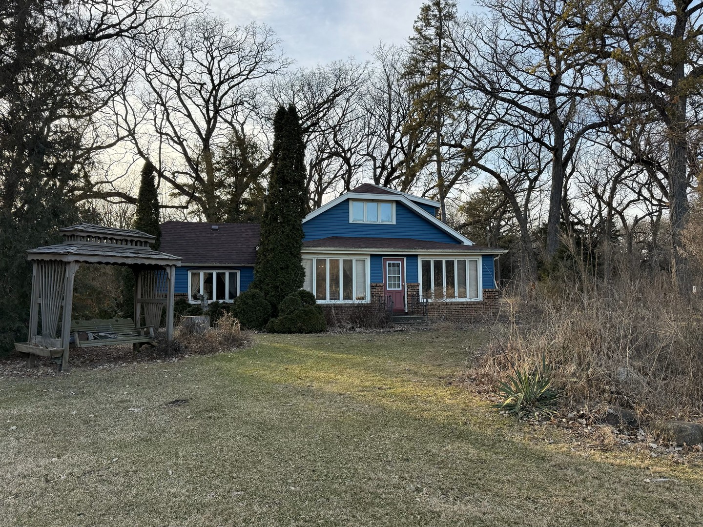 a front view of a house with yard
