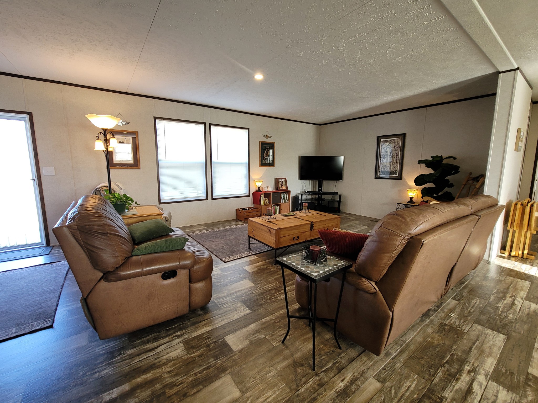 590 Jump Off Mountain Road Sewanee, TN 37375 - Photo 6 of 22 a living room with furniture and a flat screen tv