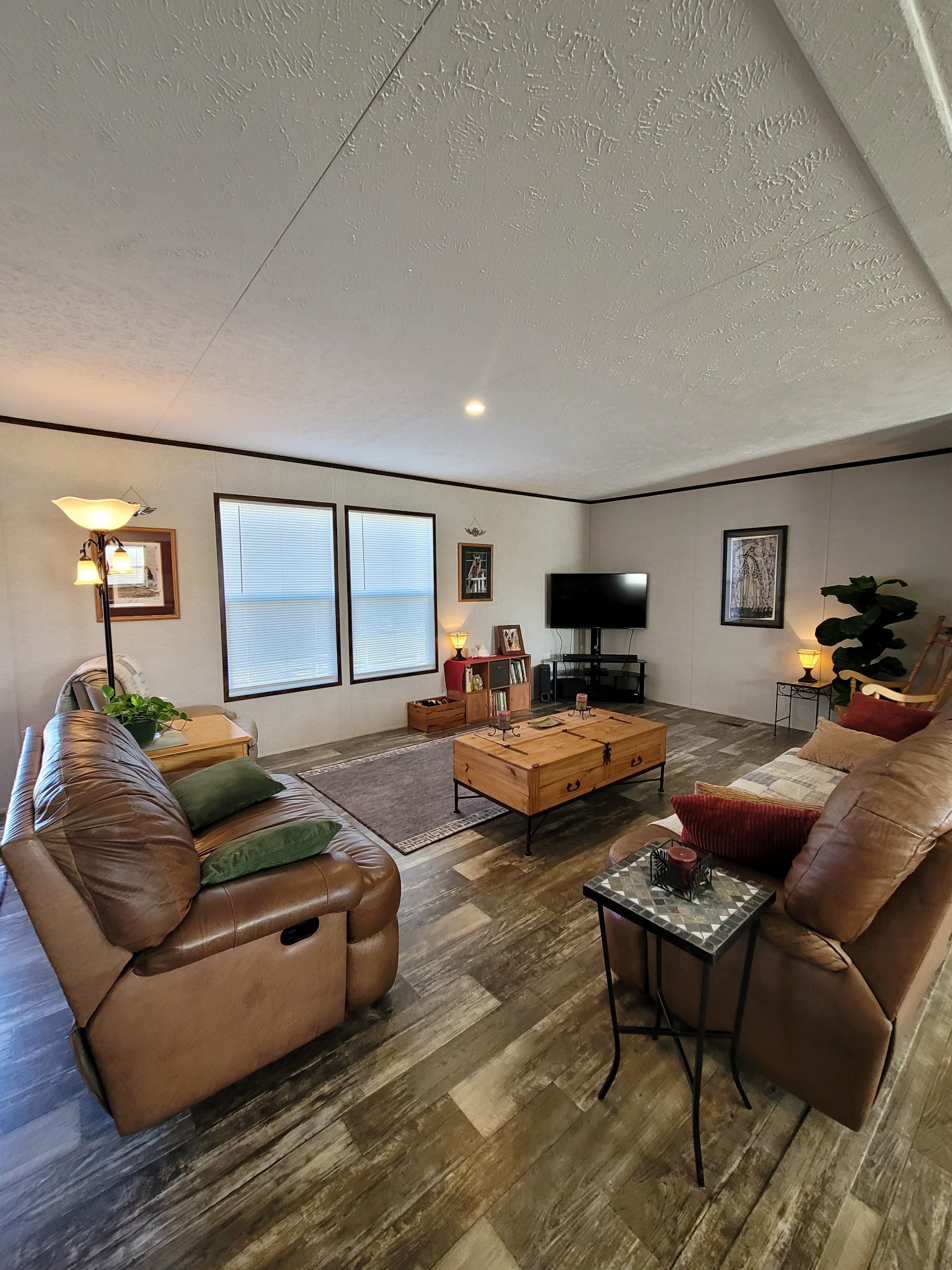 590 Jump Off Mountain Road Sewanee, TN 37375 - Photo 8 of 22 a living room with furniture and a flat screen tv