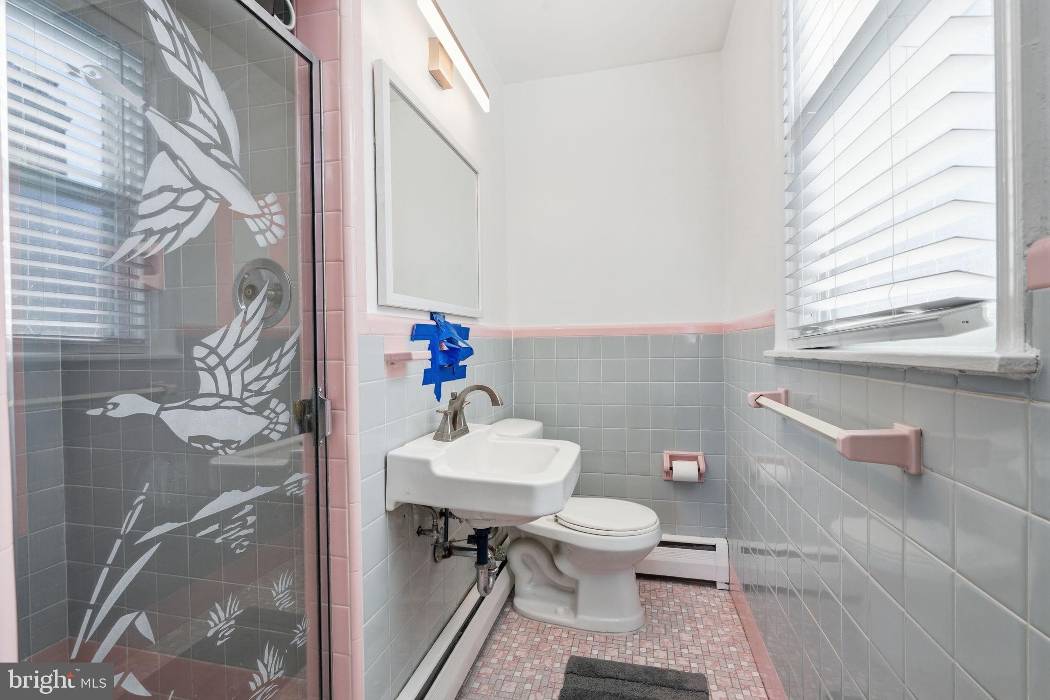 1025 Friendship Street Philadelphia, PA 19111 - Photo 20 of 36 Charming vintage bathroom with pastel hues.