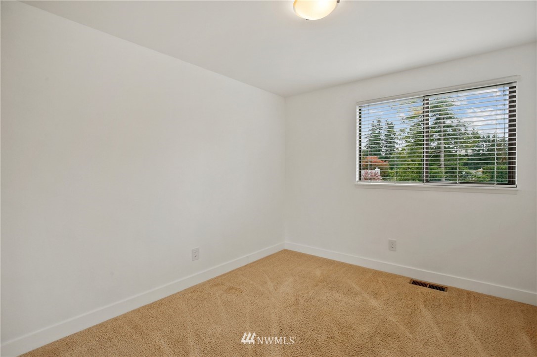 15504 Southeast 178th Place Renton, WA 98058 - Photo 15 of 40 a view of a room with a window