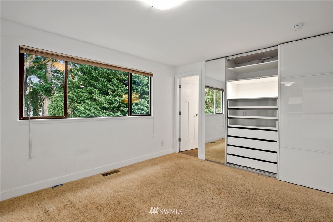 15504 Southeast 178th Place Renton, WA 98058 - Photo 18 of 40 a view of an empty room with a window
