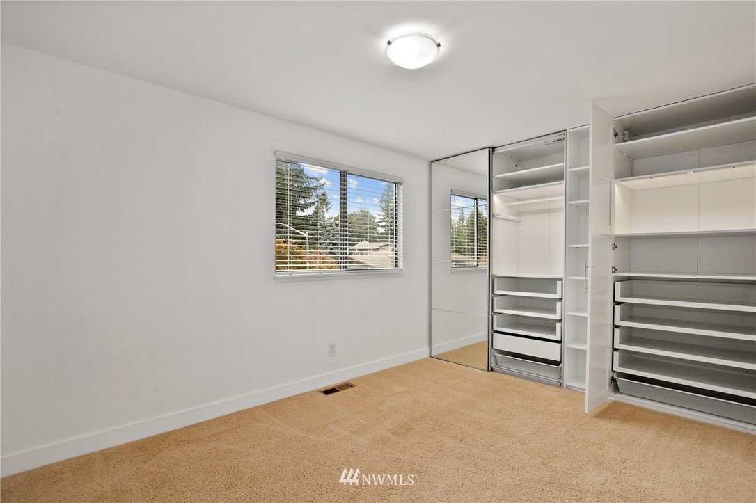 15504 Southeast 178th Place Renton, WA 98058 - Photo 20 of 40 a view of room with air conditioner and window