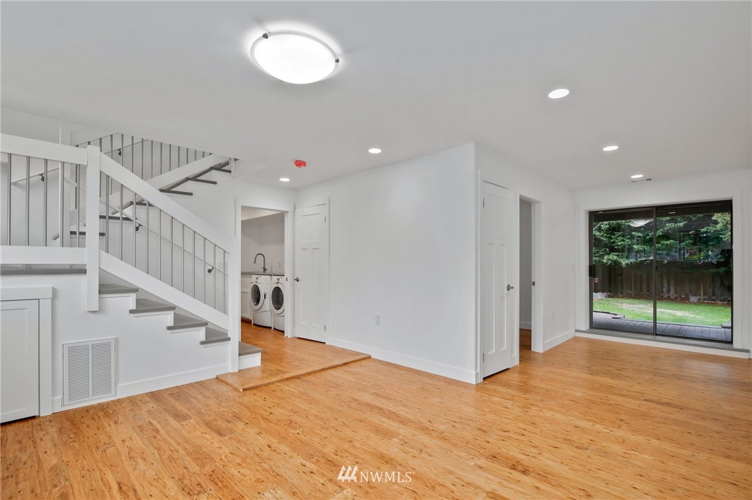 15504 Southeast 178th Place Renton, WA 98058 - Photo 31 of 40 a view of empty room with wooden floor and fan