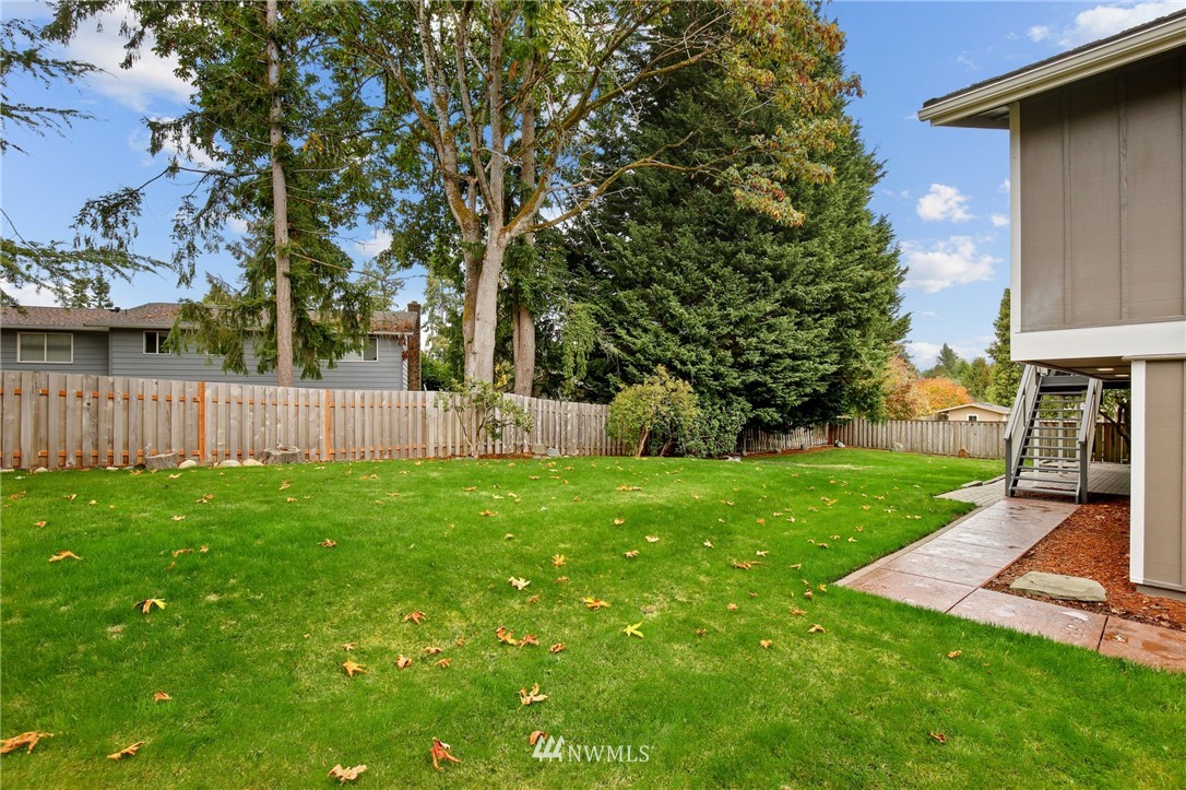 15504 Southeast 178th Place Renton, WA 98058 - Photo 35 of 40 a view of a backyard with a garden