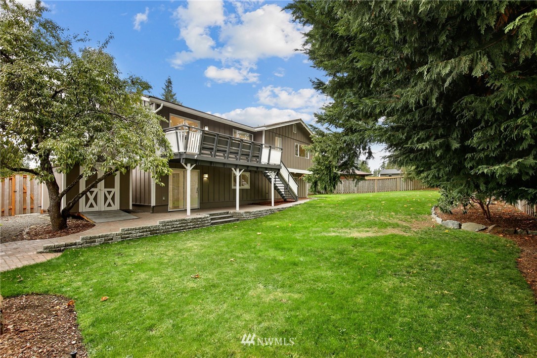 15504 Southeast 178th Place Renton, WA 98058 - Photo 37 of 40 a view of a house with a yard