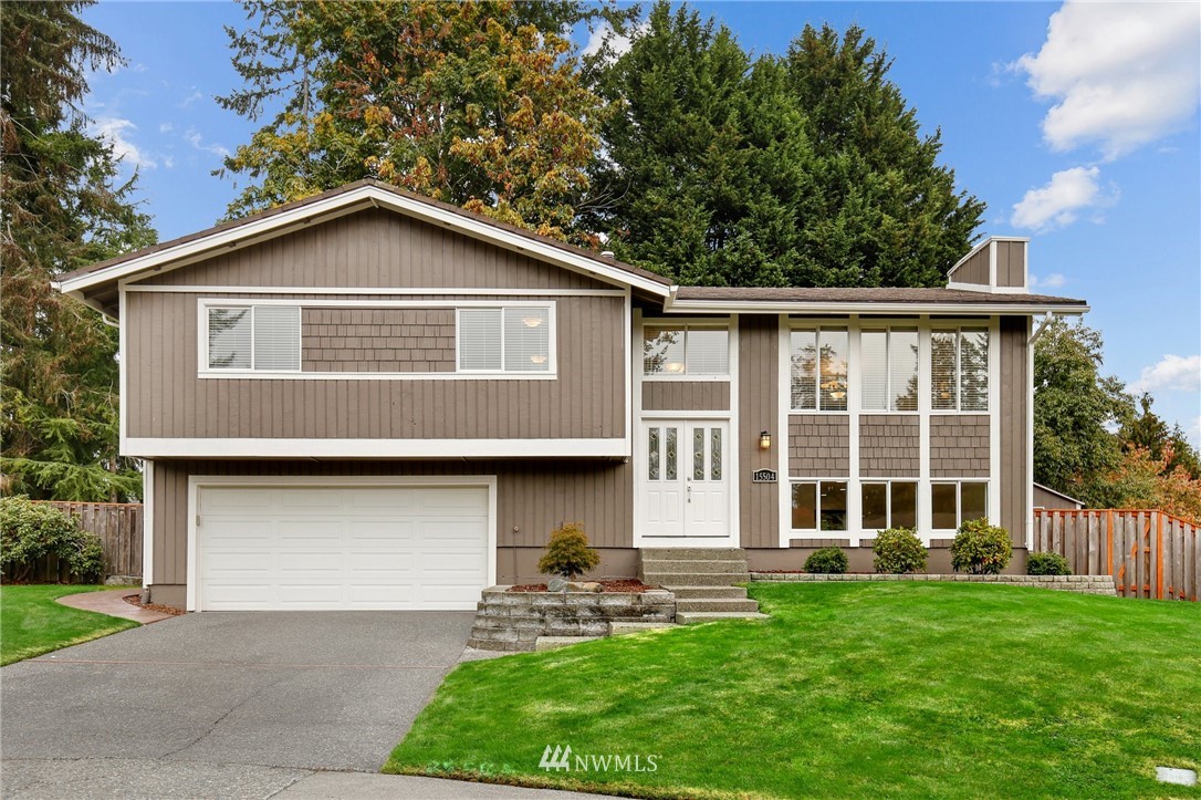 15504 Southeast 178th Place Renton, WA 98058 - Photo 38 of 40 front view of a house with a yard