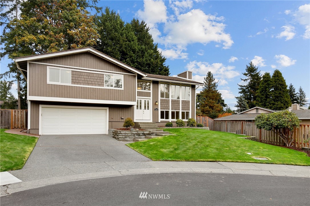 15504 Southeast 178th Place Renton, WA 98058 - Photo 39 of 40 a front view of house with yard and green space