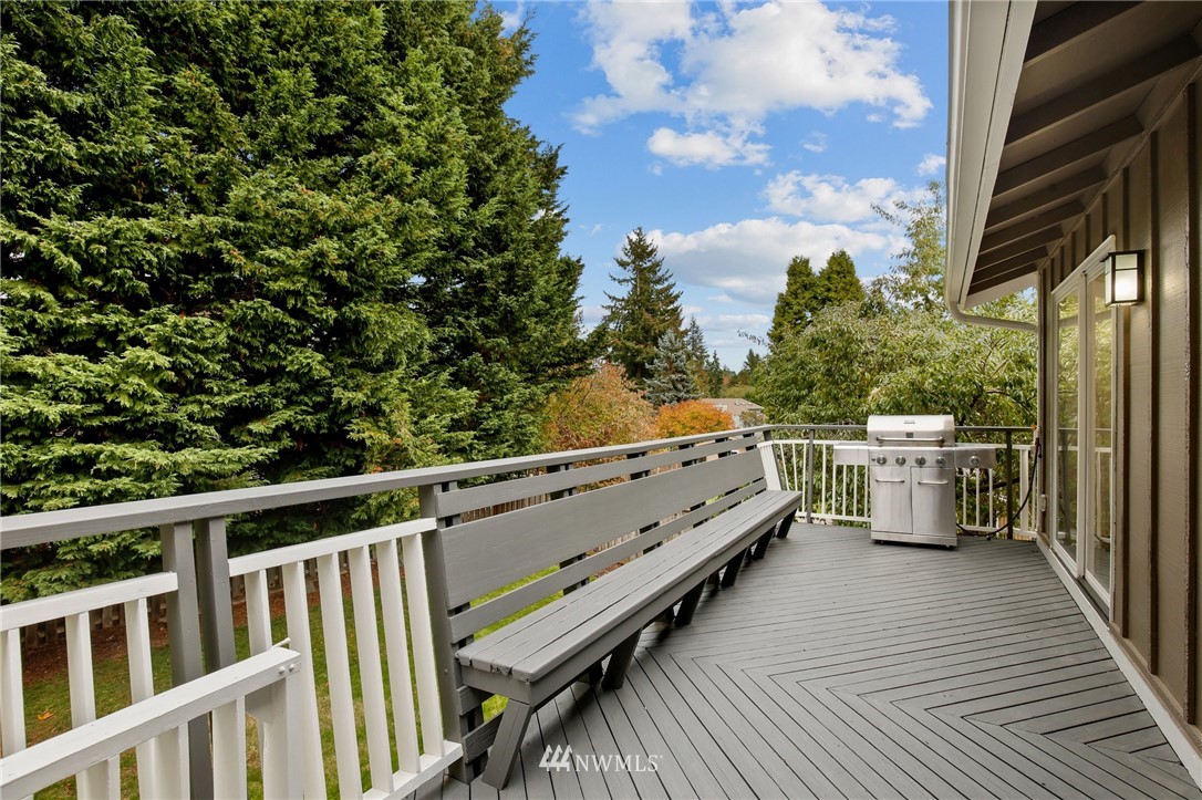 15504 Southeast 178th Place Renton, WA 98058 - Photo 7 of 40 a view of balcony with a car parked
