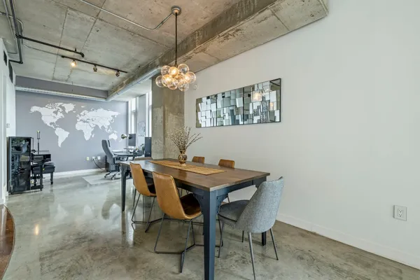 a view of a workspace with furniture