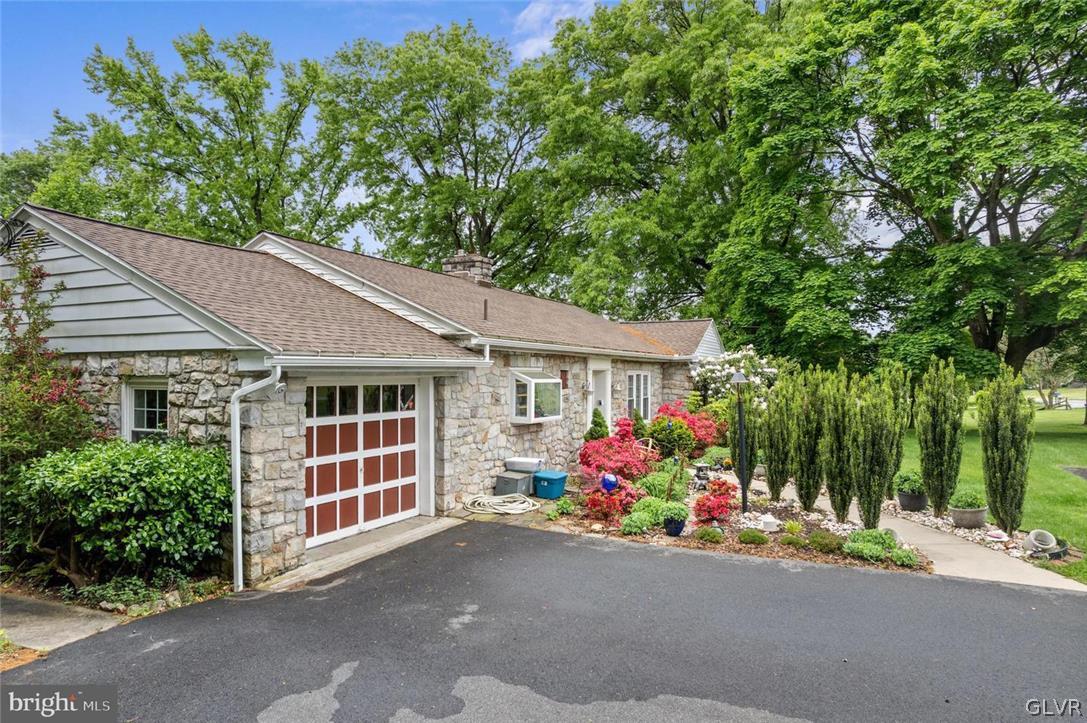5081 Oley Turnpike Road Reading, PA 19606 - Photo 3 of 44 a front view of a house with a garage