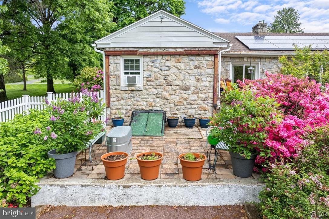 5081 Oley Turnpike Road Reading, PA 19606 - Photo 44 of 44 a front view of a house with potted plants