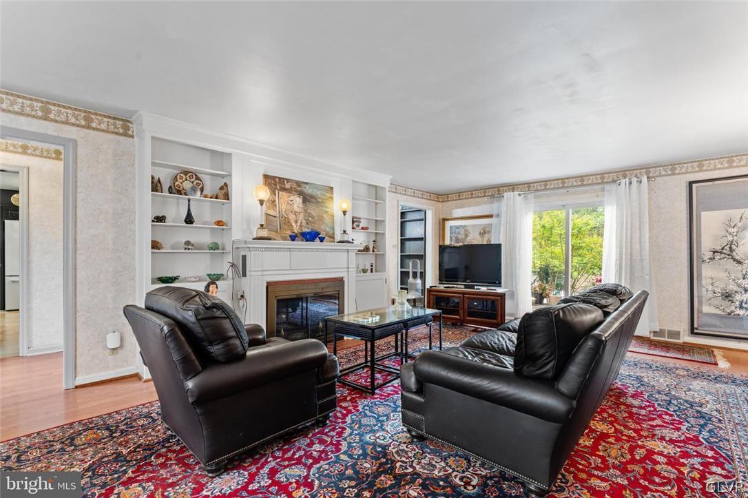 5081 Oley Turnpike Road Reading, PA 19606 - Photo 5 of 44 a living room with furniture fireplace and window