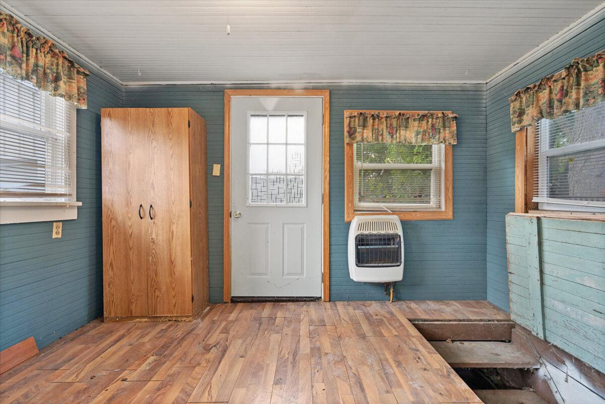 206 South Main Street Morocco, IN 47963 - Photo 13 of 26 a bedroom with a bed and wooden floor