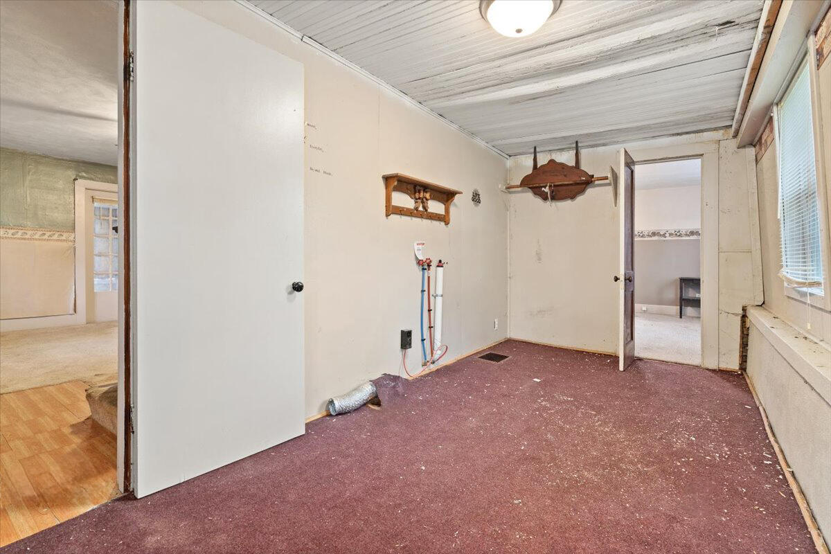 206 South Main Street Morocco, IN 47963 - Photo 14 of 26 a view of empty room with wooden floor