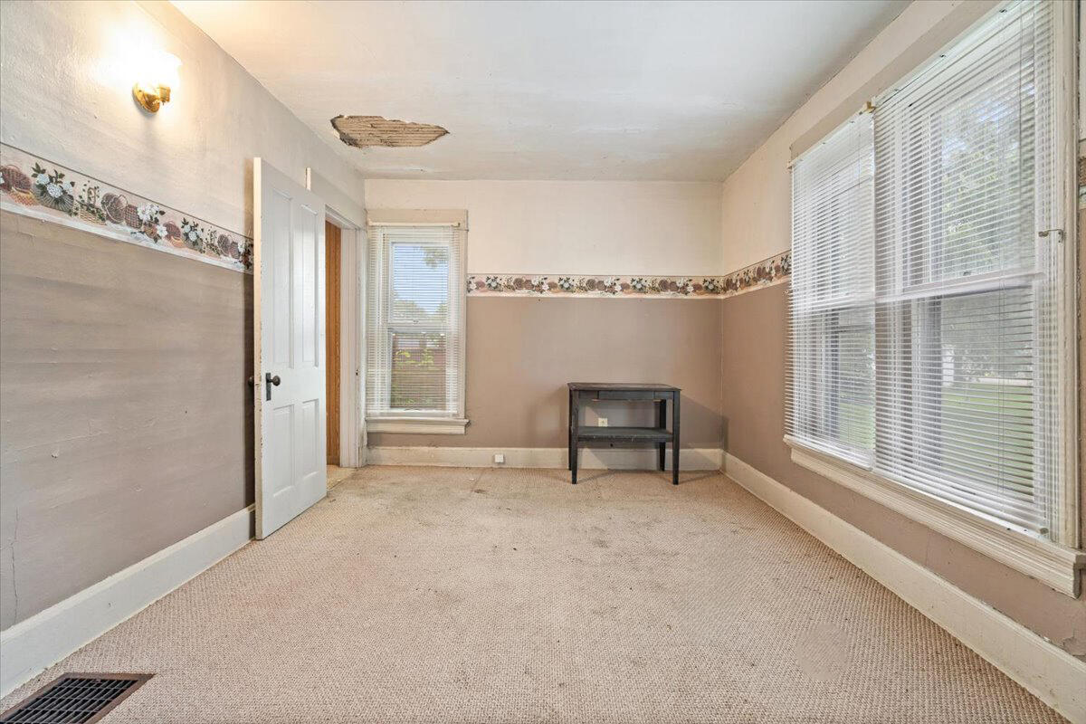 206 South Main Street Morocco, IN 47963 - Photo 15 of 26 a view of an empty room with a window