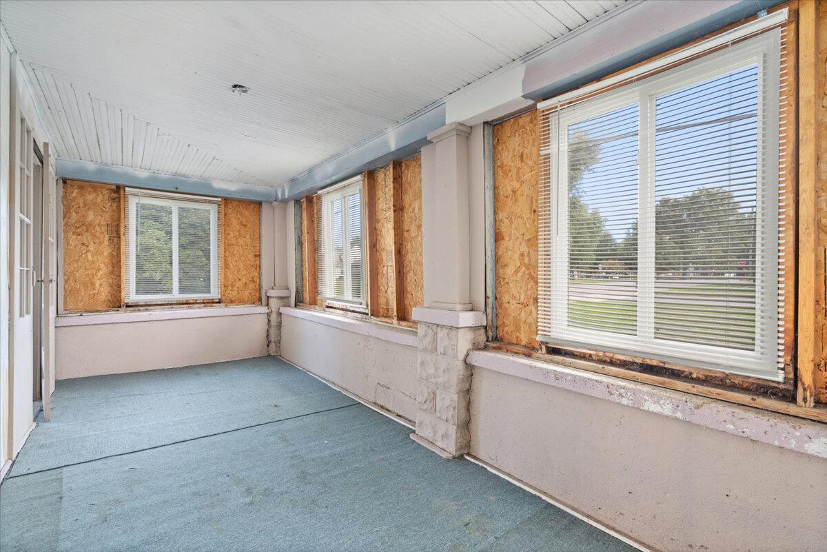 206 South Main Street Morocco, IN 47963 - Photo 5 of 26 a view of an empty room with a window