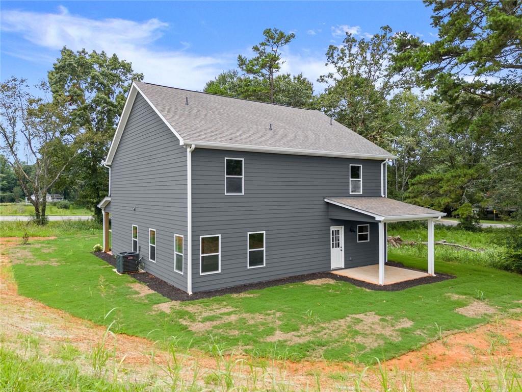 182 Hardman Road Clarkesville, GA 30523 - Photo 51 of 62 a view of a house with a yard