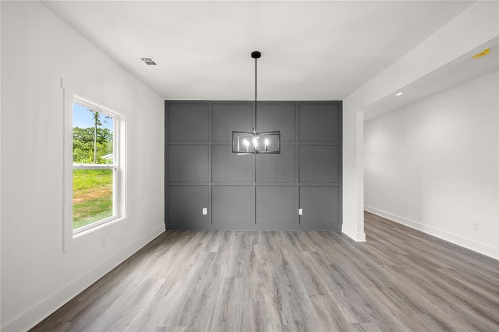 182 Hardman Road Clarkesville, GA 30523 - Photo 10 of 62 a view of a room with window wooden floor and windows