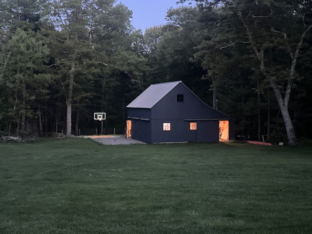 4 Solstice Way Sharon, MA 02067 - Photo 20 of 22 a house view with a garden space