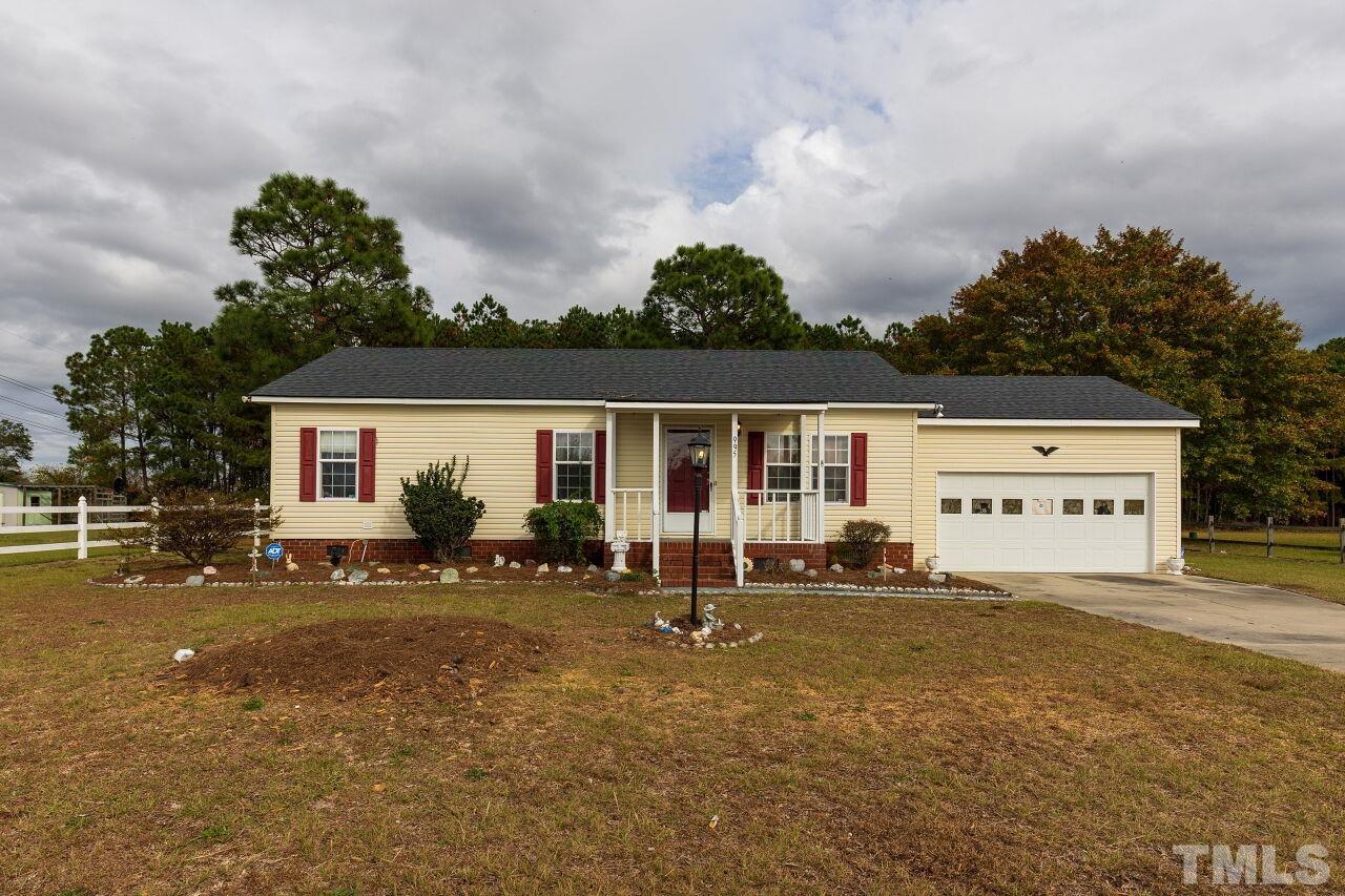 995 Genoa Road Dudley, NC 28333 - Photo 1 of 28 front view of house with a yard
