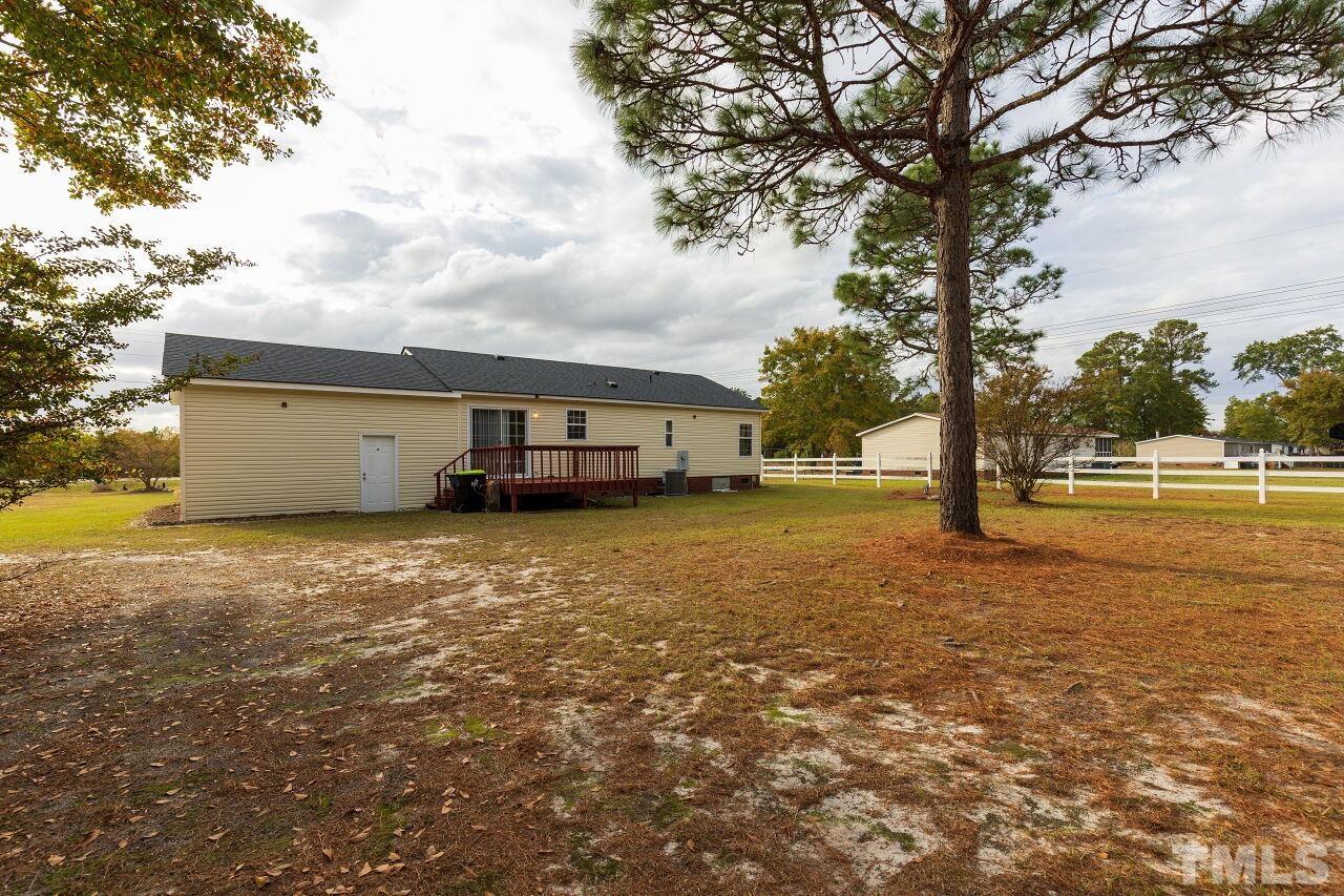 995 Genoa Road Dudley, NC 28333 - Photo 28 of 28 a house view with a garden space