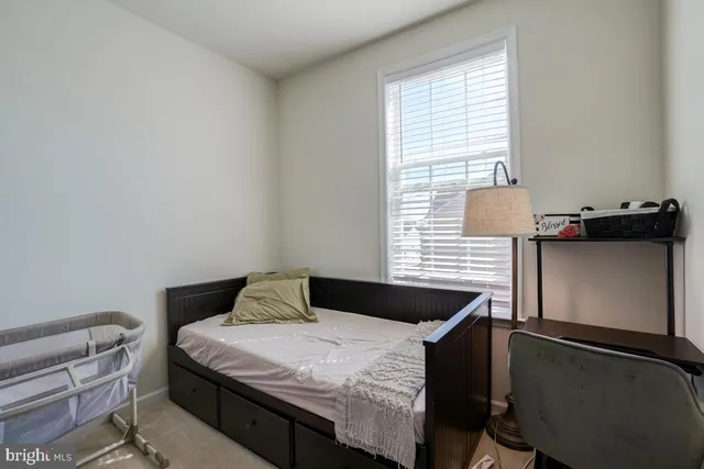 a bathroom with a tub and shower