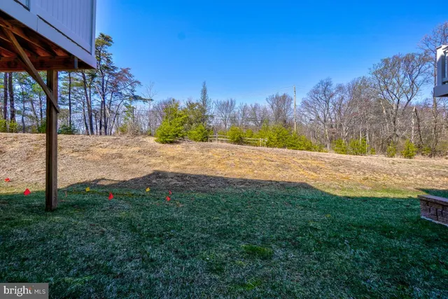 a brick house with a yard