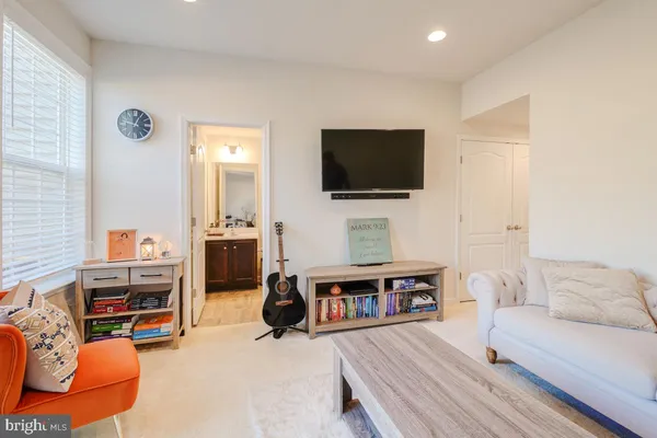 a living room with furniture and a couch