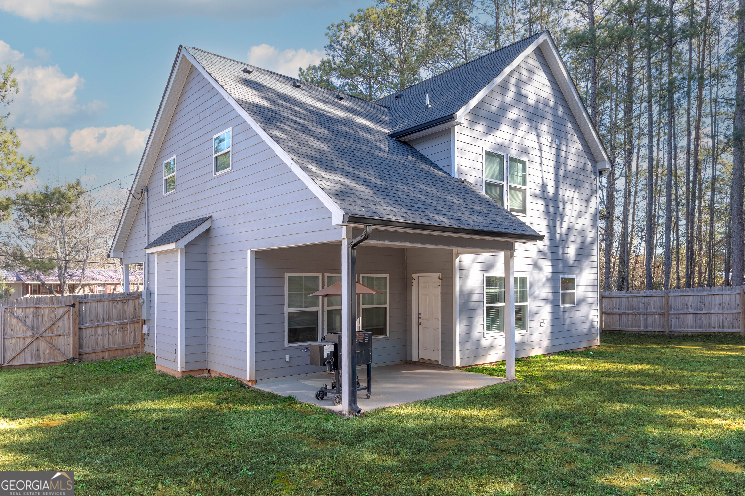 157 Watkins Road Flovilla, GA 30216 - Photo 27 of 31 a view of a house with a yard and staircase