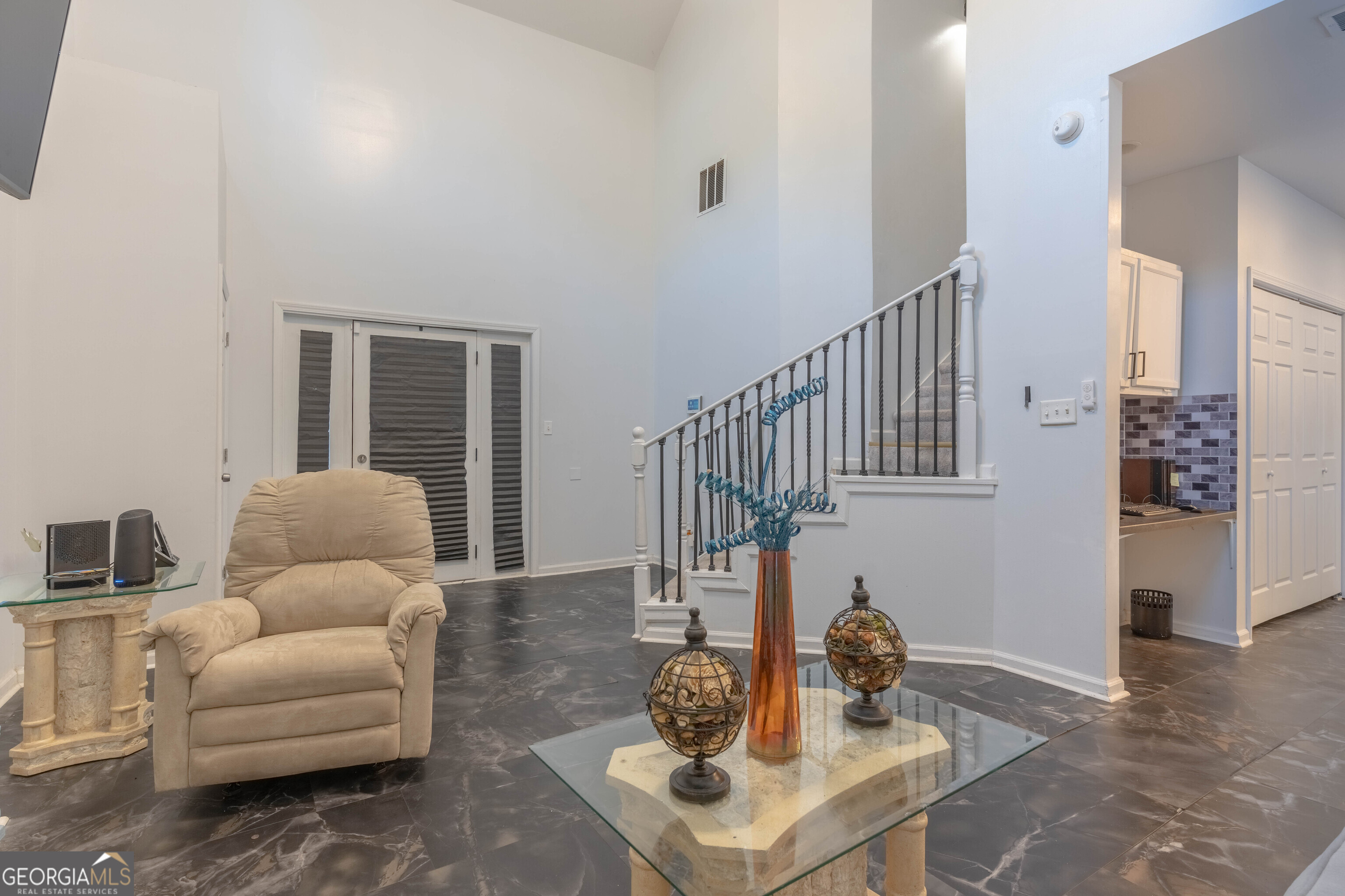 157 Watkins Road Flovilla, GA 30216 - Photo 3 of 31 a living room with furniture and a table