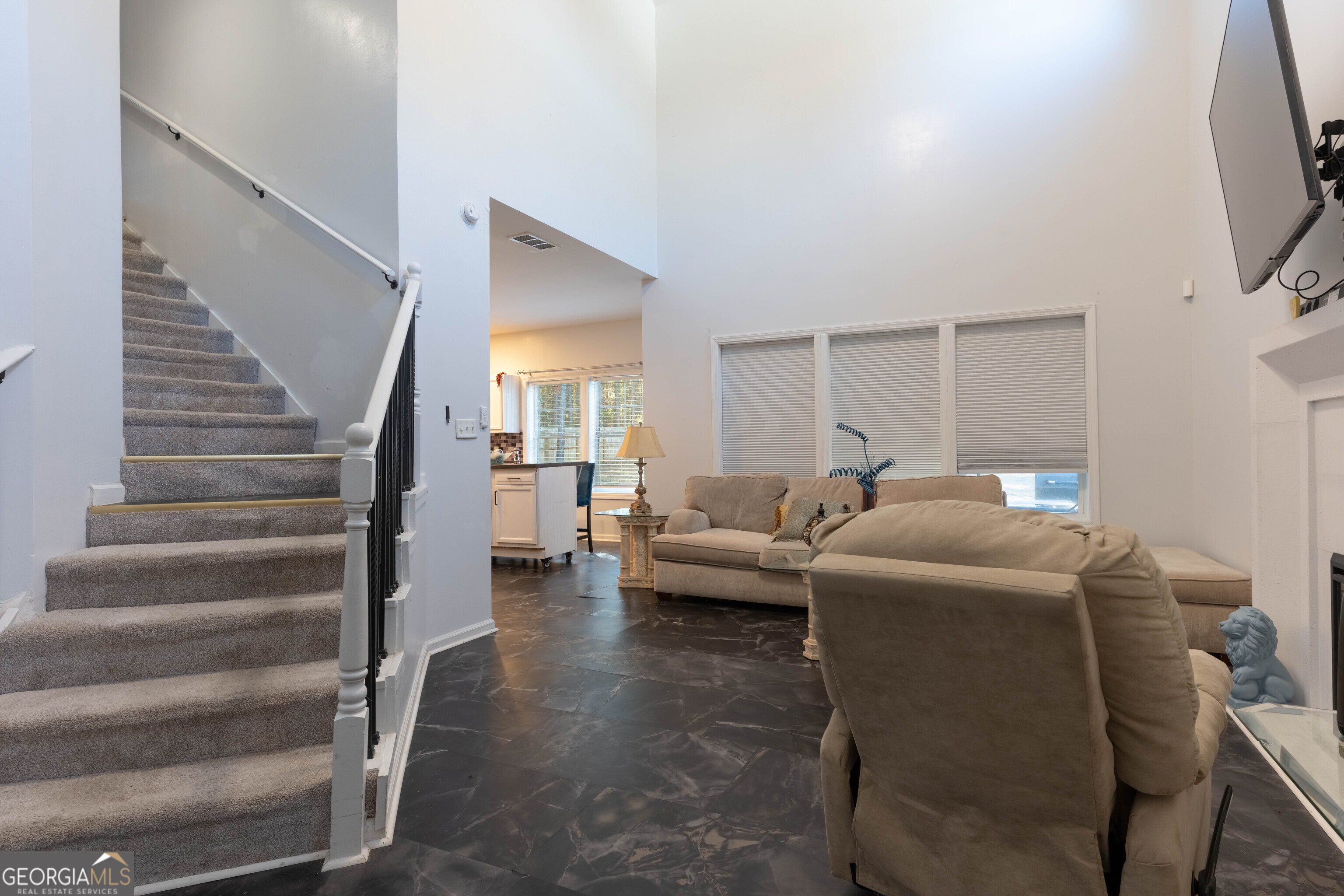 157 Watkins Road Flovilla, GA 30216 - Photo 6 of 31 a living room with furniture and a flat screen tv