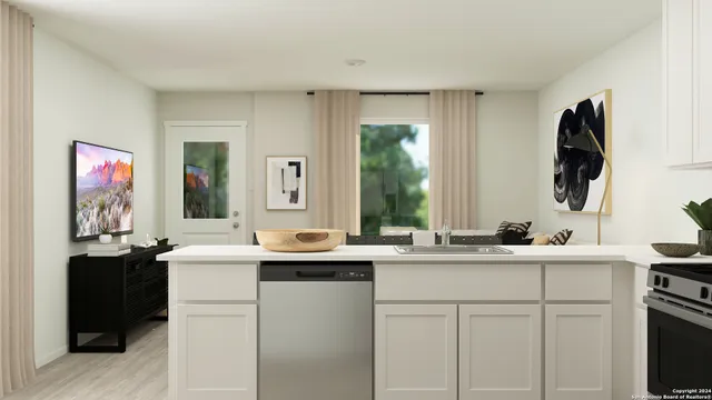 a kitchen with a sink and a window