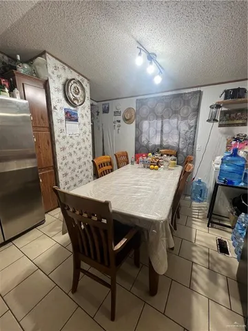 a outdoor dining space with furniture and a table