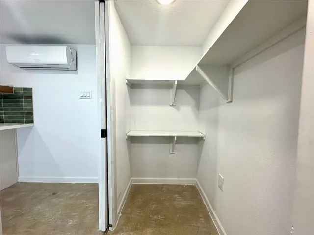 a view of storage and utility room