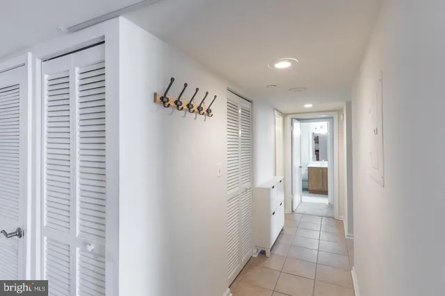 a bathroom with a glass door shower