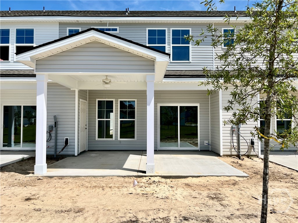 105 Pinebury Road Pooler, GA 31322 - Photo 16 of 24 Photo taken 7.3.26. HOME IS UNDER CONSTRUCTION. Huge covered back porch with expanded patio - great for entertaining and grilling!