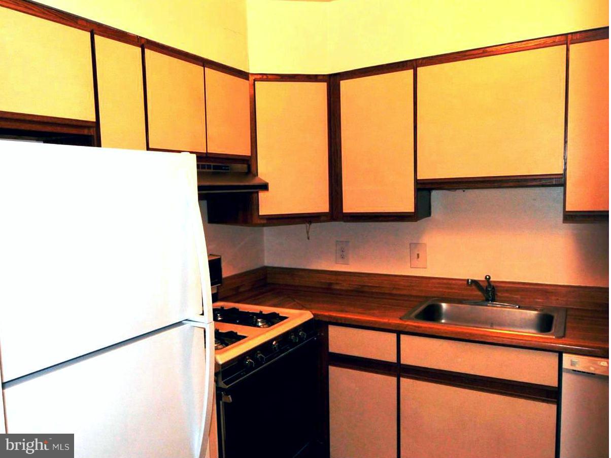 505 Epsom Road, Unit TA Towson, MD 21286 - Photo 4 of 11 a kitchen with a sink and a window