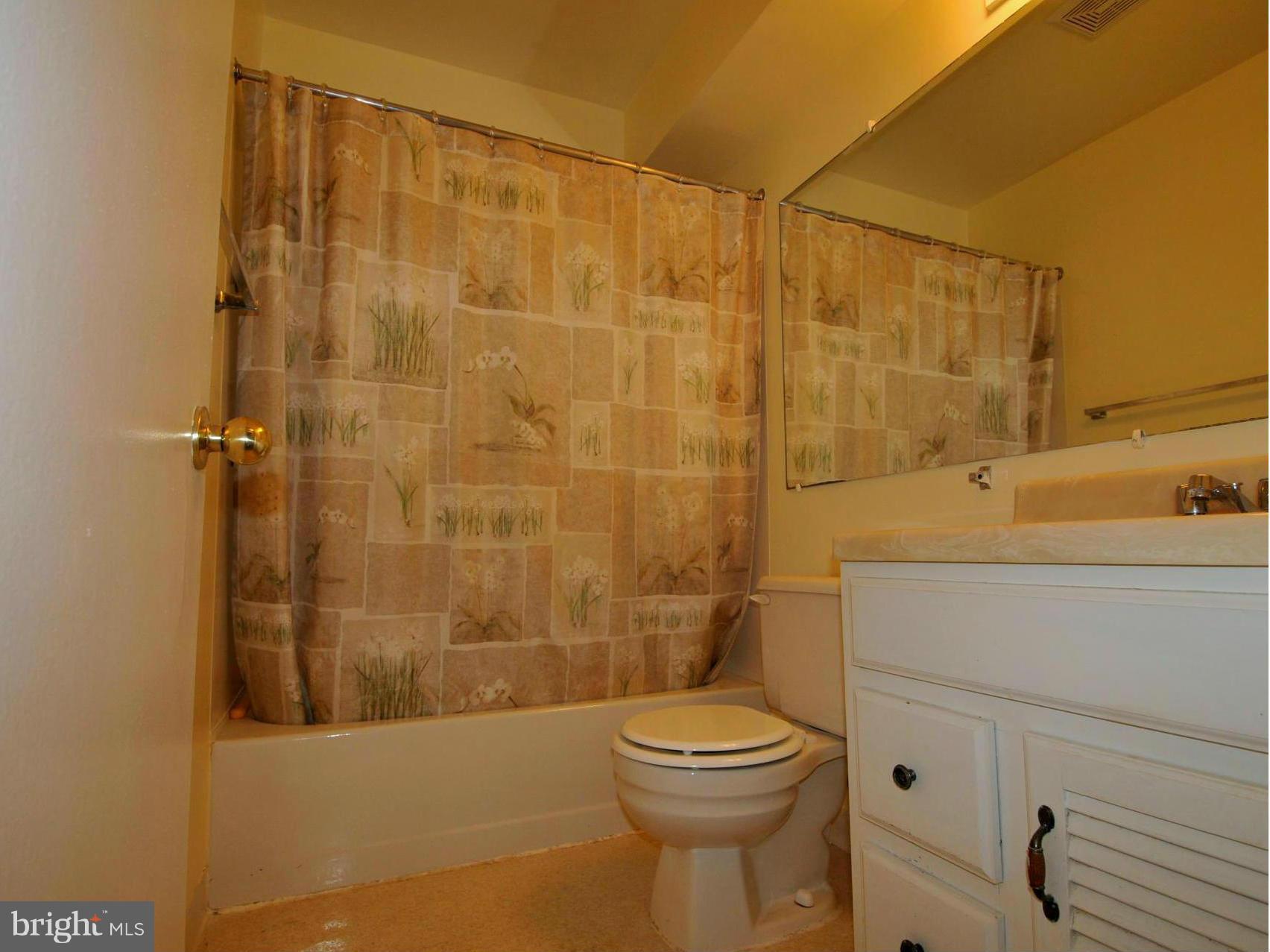505 Epsom Road, Unit TA Towson, MD 21286 - Photo 8 of 11 a bathroom with a sink a toilet and shower
