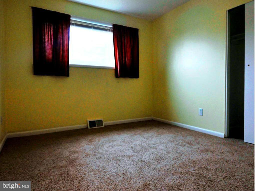 505 Epsom Road, Unit TA Towson, MD 21286 - Photo 9 of 11 an empty room with windows