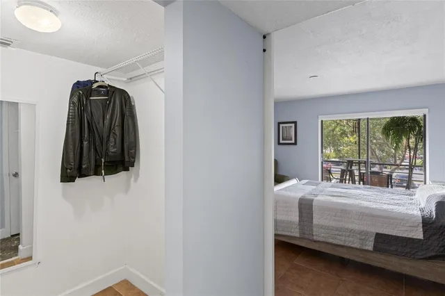 a view of house with swimming pool and yard