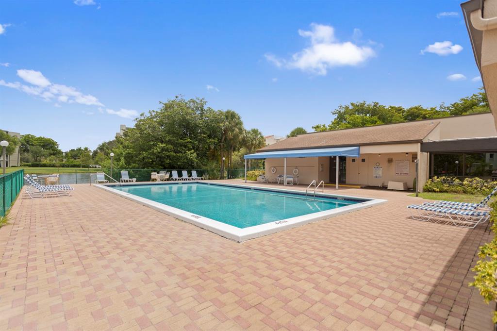 2312 South Cypress Bend Drive, Unit 205 Pompano Beach, FL 33069 - Photo 45 of 61 a view of house and outdoor space